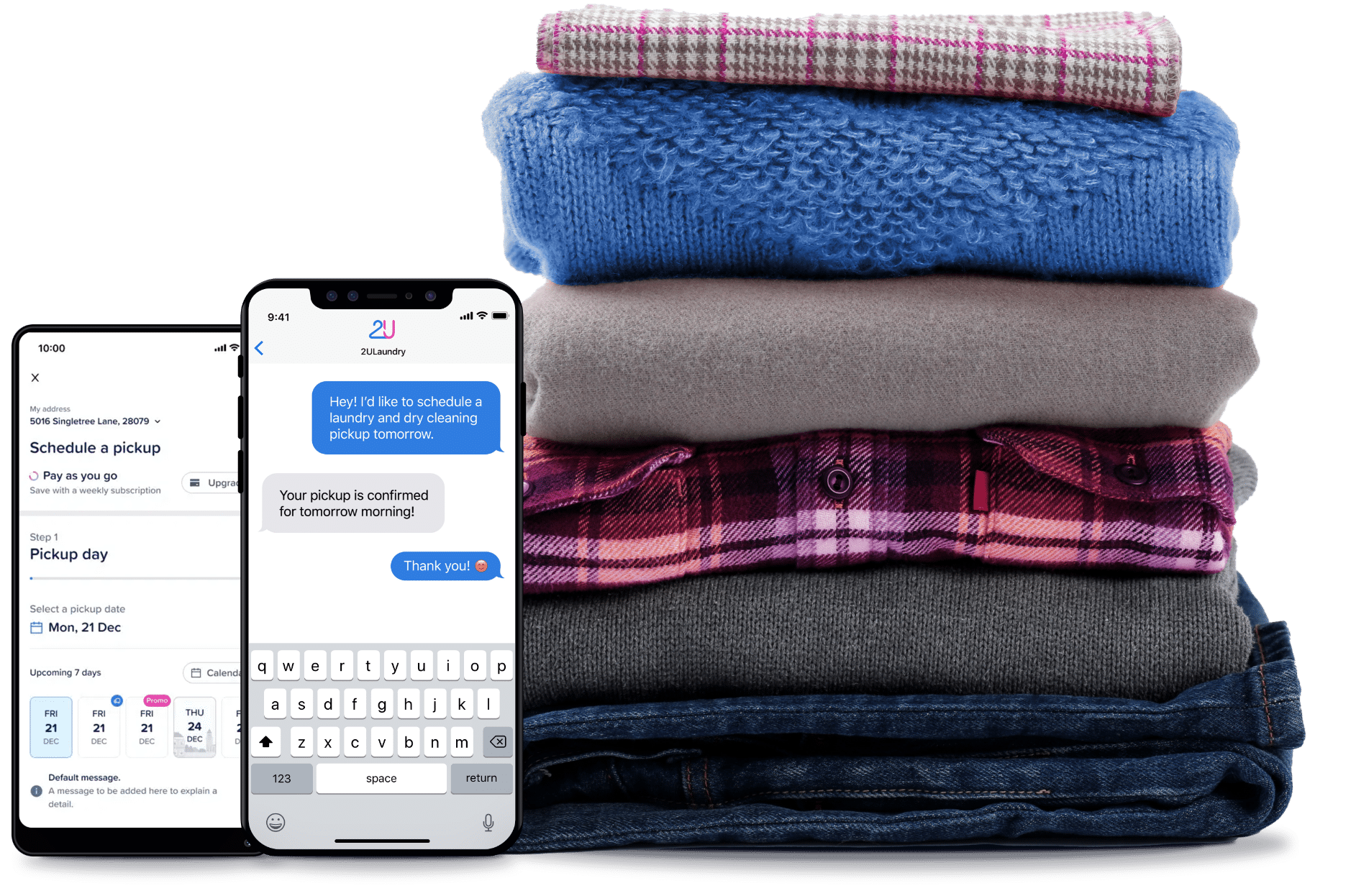 Devices next to a stack of neatly folded laundry